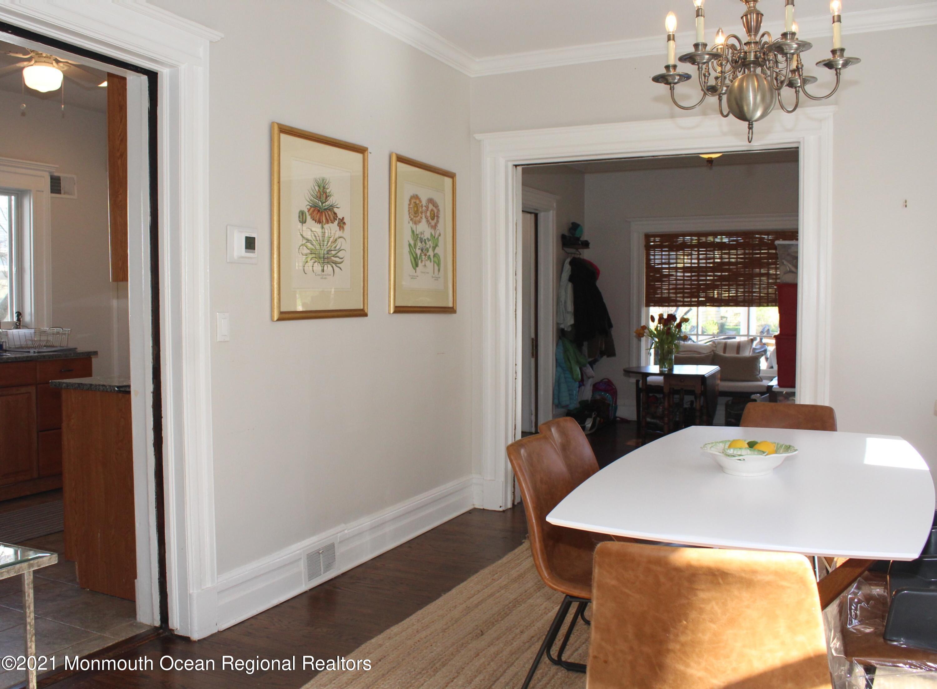 675 River Road Fair Haven, NJ 07704 - Photo 8 of 36 a view of a dining room with furniture and wooden floor