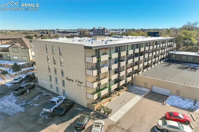 a view of city with tall buildings
