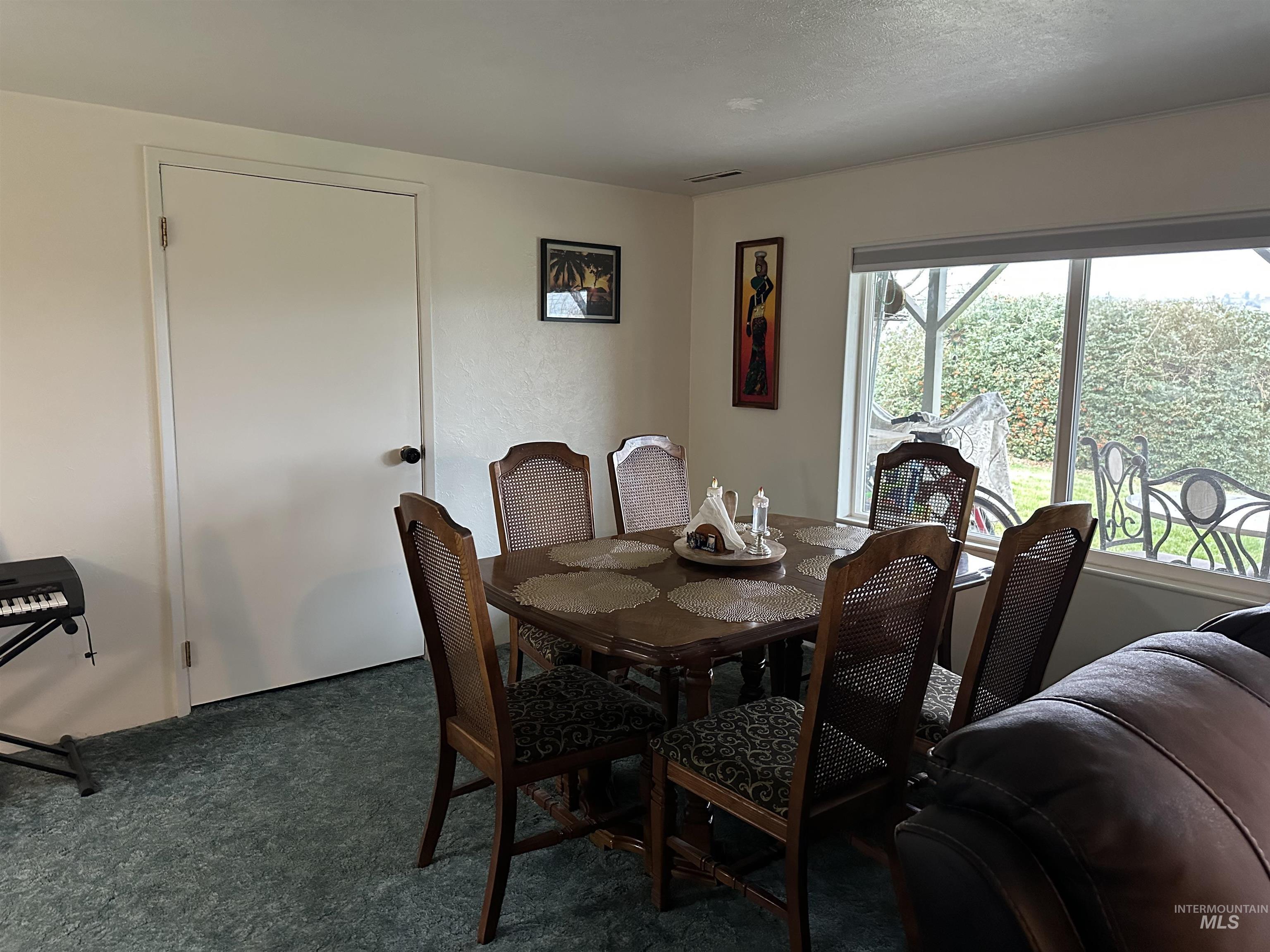 3214 Meadowlark Drive Lewiston, ID 83501 - Photo 21 of 25 Dining area featuring dark carpet