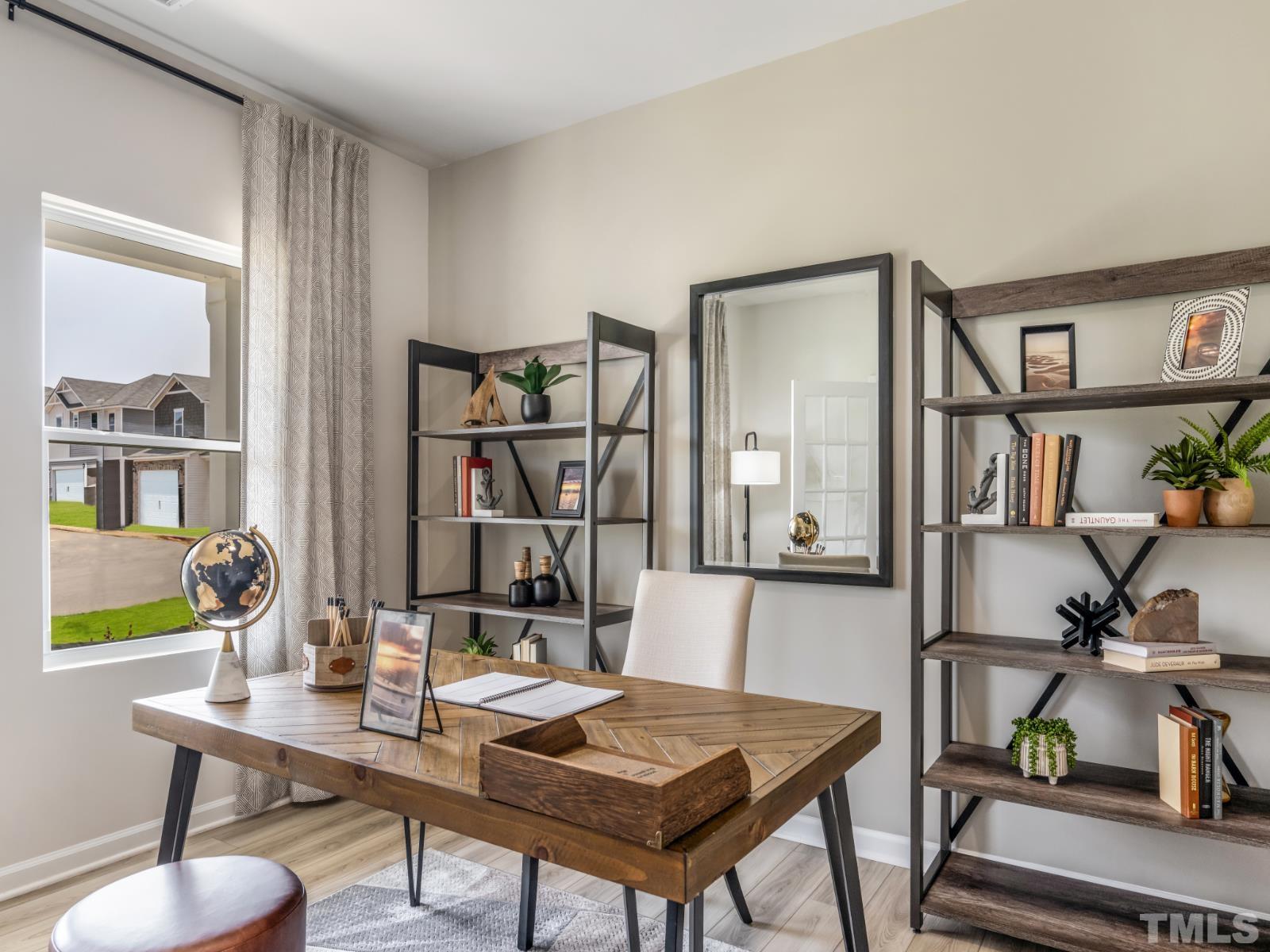 3005 Farndale Trace Durham, NC 27712 - Photo 13 of 14 a view of a workspace with furniture
