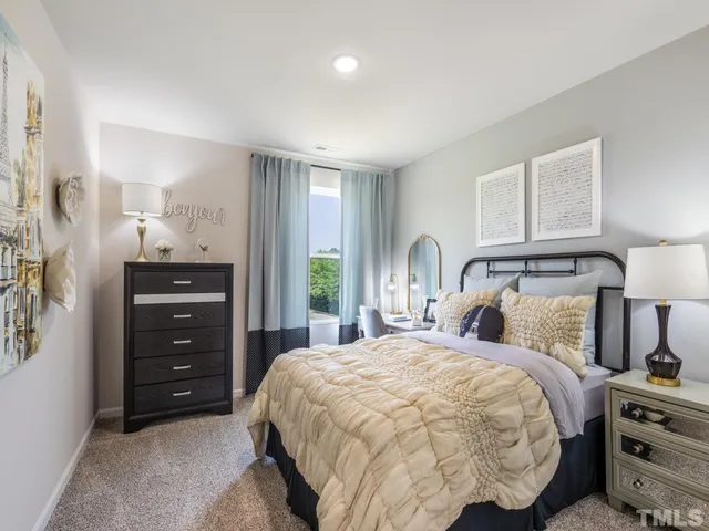 a bedroom with a bed and a closet