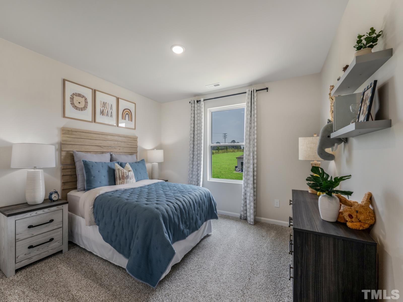 3005 Farndale Trace Durham, NC 27712 - Photo 5 of 14 a bedroom with a bed and a potted plant