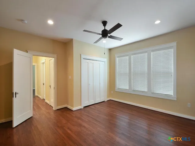 a view of kitchen with cabinets