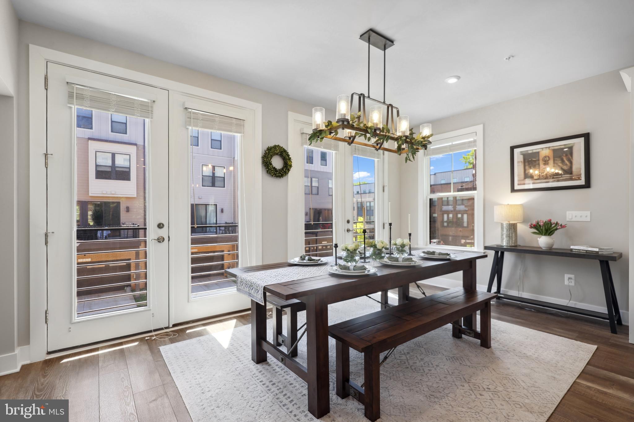 1653 Bandit Loop Reston, VA 20190 - Photo 33 of 53 a view of a dining room with furniture and wooden floor