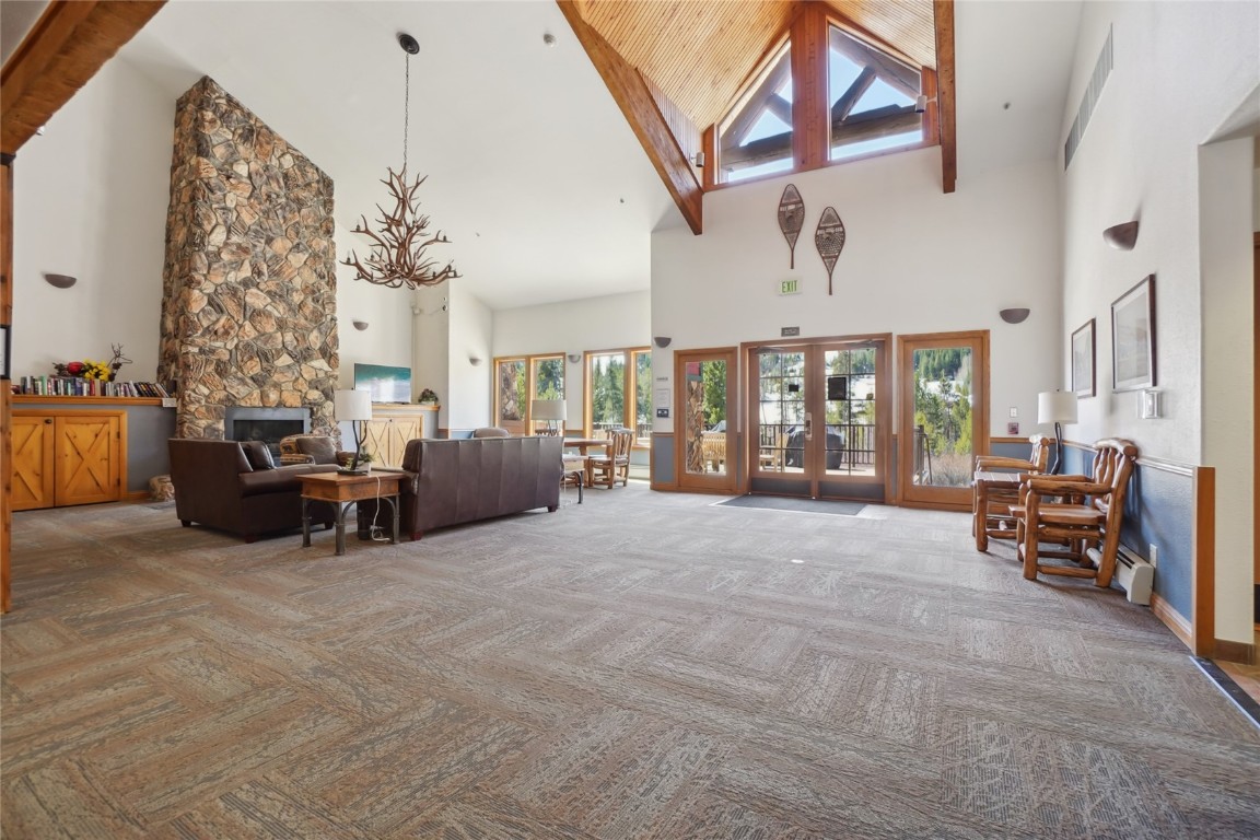 22714 Highway 6, Unit 5941 Keystone, CO 80435 - Photo 24 of 41 a living room with furniture and chandelier