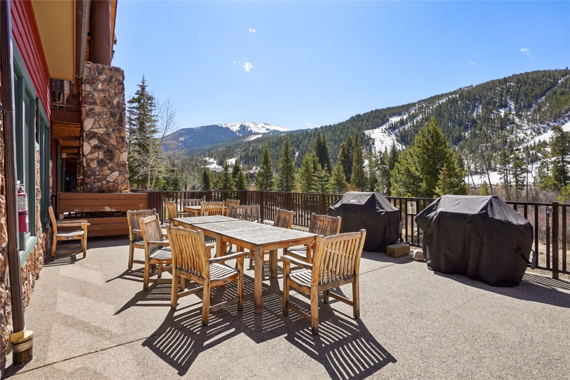 22714 Highway 6, Unit 5941 Keystone, CO 80435 - Photo 27 of 41 a view of a terrace with furniture and garden
