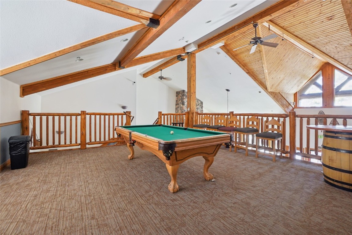 22714 Highway 6, Unit 5941 Keystone, CO 80435 - Photo 29 of 41 a backyard of a house with table and chairs