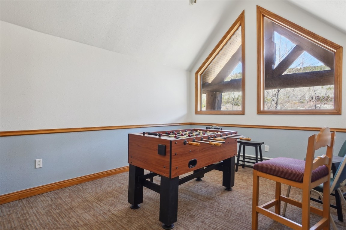 22714 Highway 6, Unit 5941 Keystone, CO 80435 - Photo 30 of 41 a room with a table and chairs