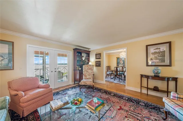 a large white bed in a white room