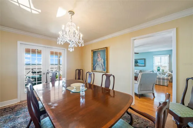 a bathroom with a double vanity sink a toilet and shower