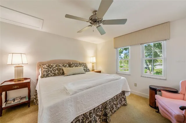 a bedroom with a bed and dresser