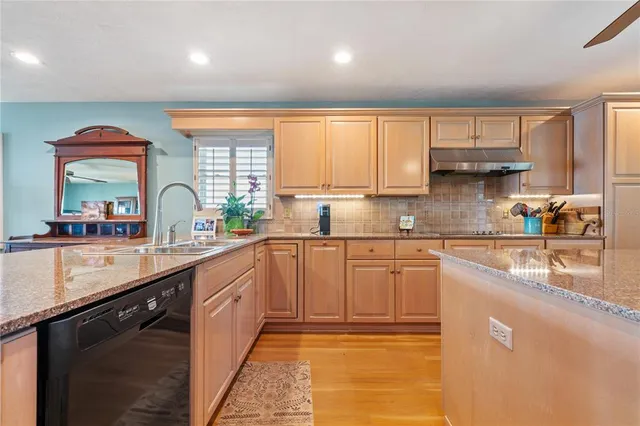 a bedroom with a bed and a car