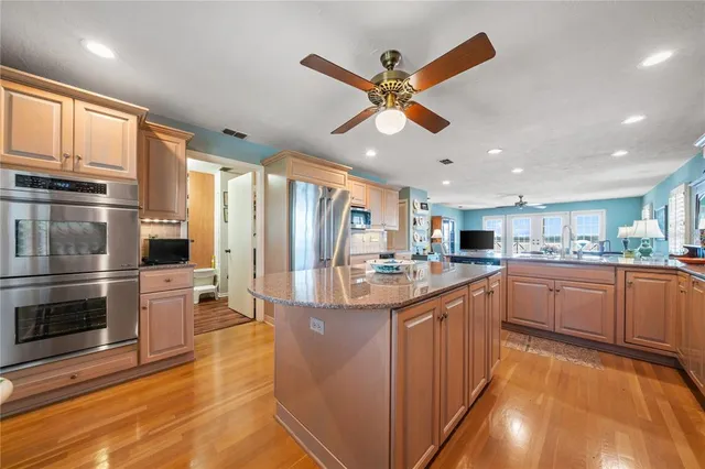 a view of a hallway view with living space and furniture