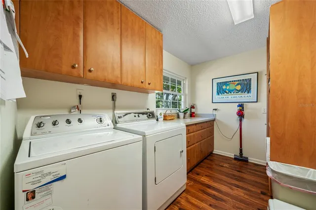 an aerial view of a house with a lake view