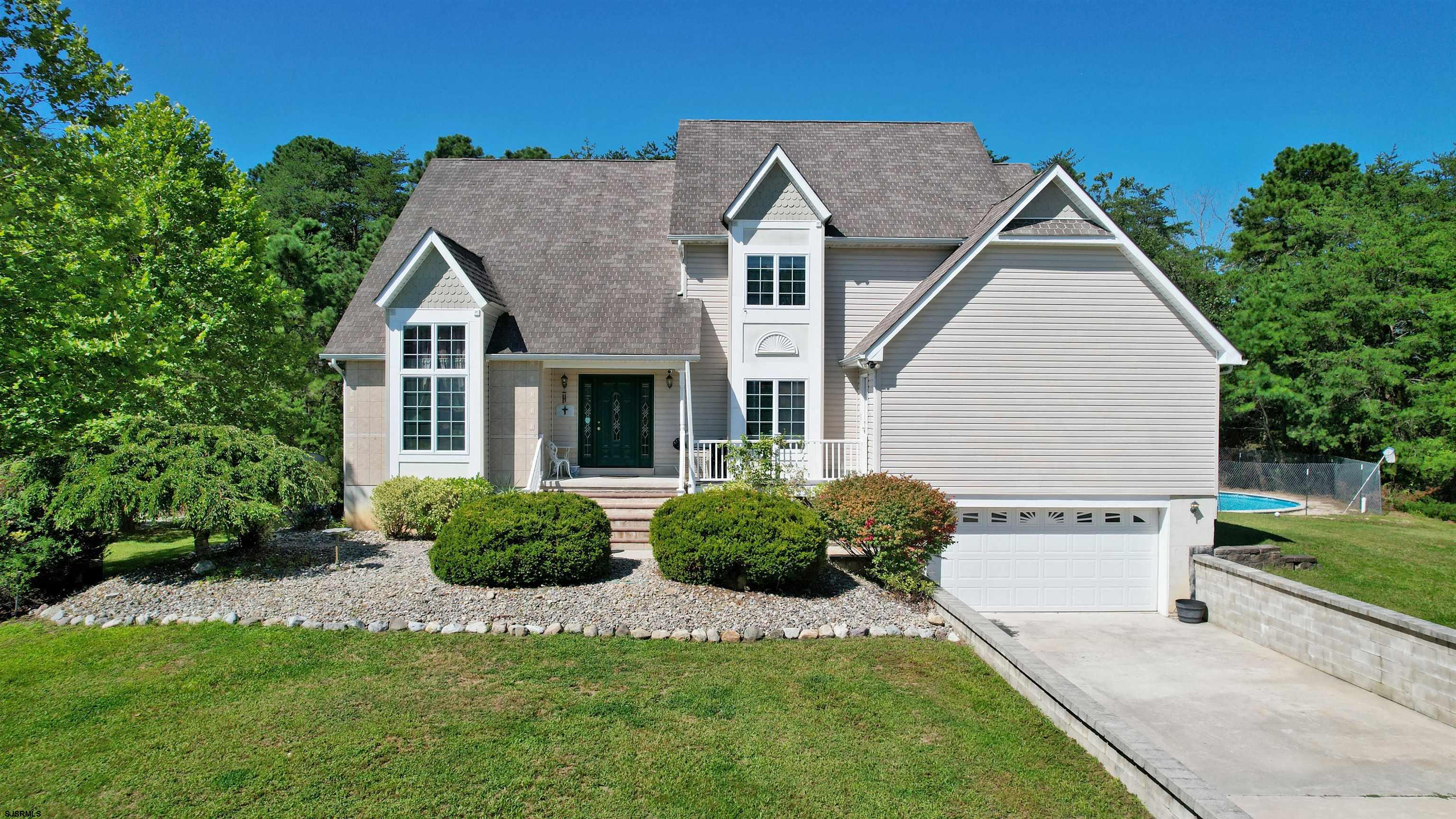 892 Hogbin Road Millville, NJ 08332 - Photo 1 of 63 a view of a house with a yard and plants