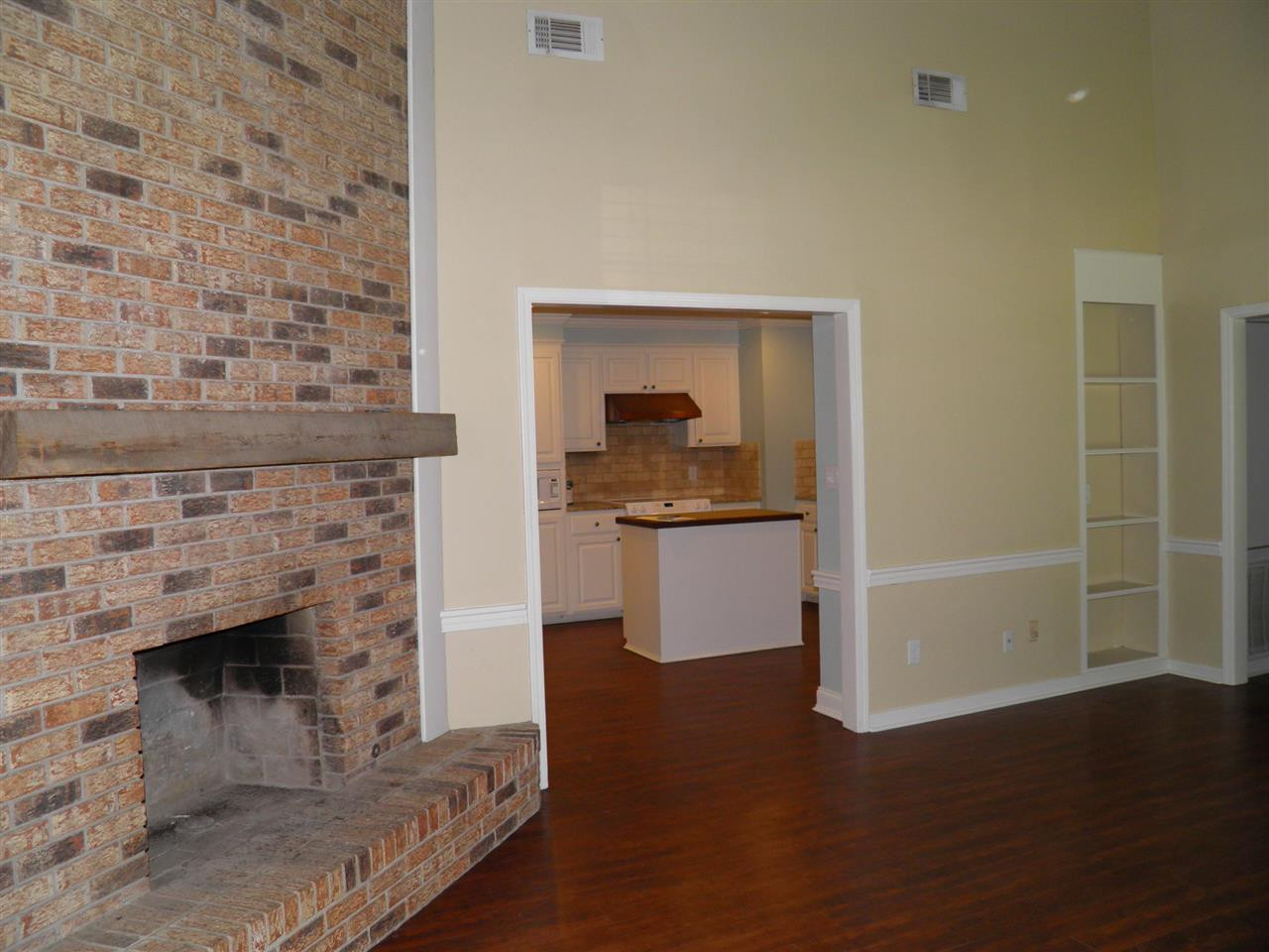 102 Lowe Circle Clinton, MS 39056 - Photo 2 of 31 Corner fireplace, laminate wood flooring