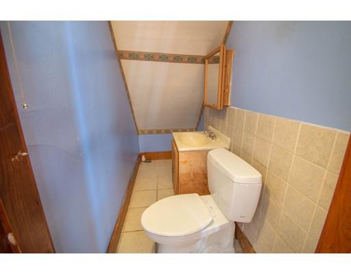 80 Grand Street Springfield, MA 01108 - Photo 13 of 24 a bathroom with a toilet and a sink