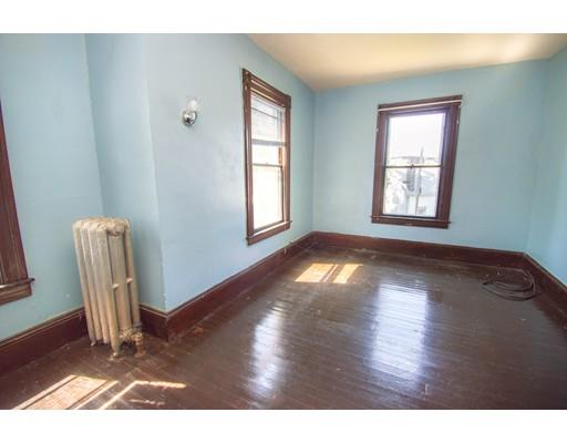 80 Grand Street Springfield, MA 01108 - Photo 18 of 24 a view of empty room with wooden floor and fan