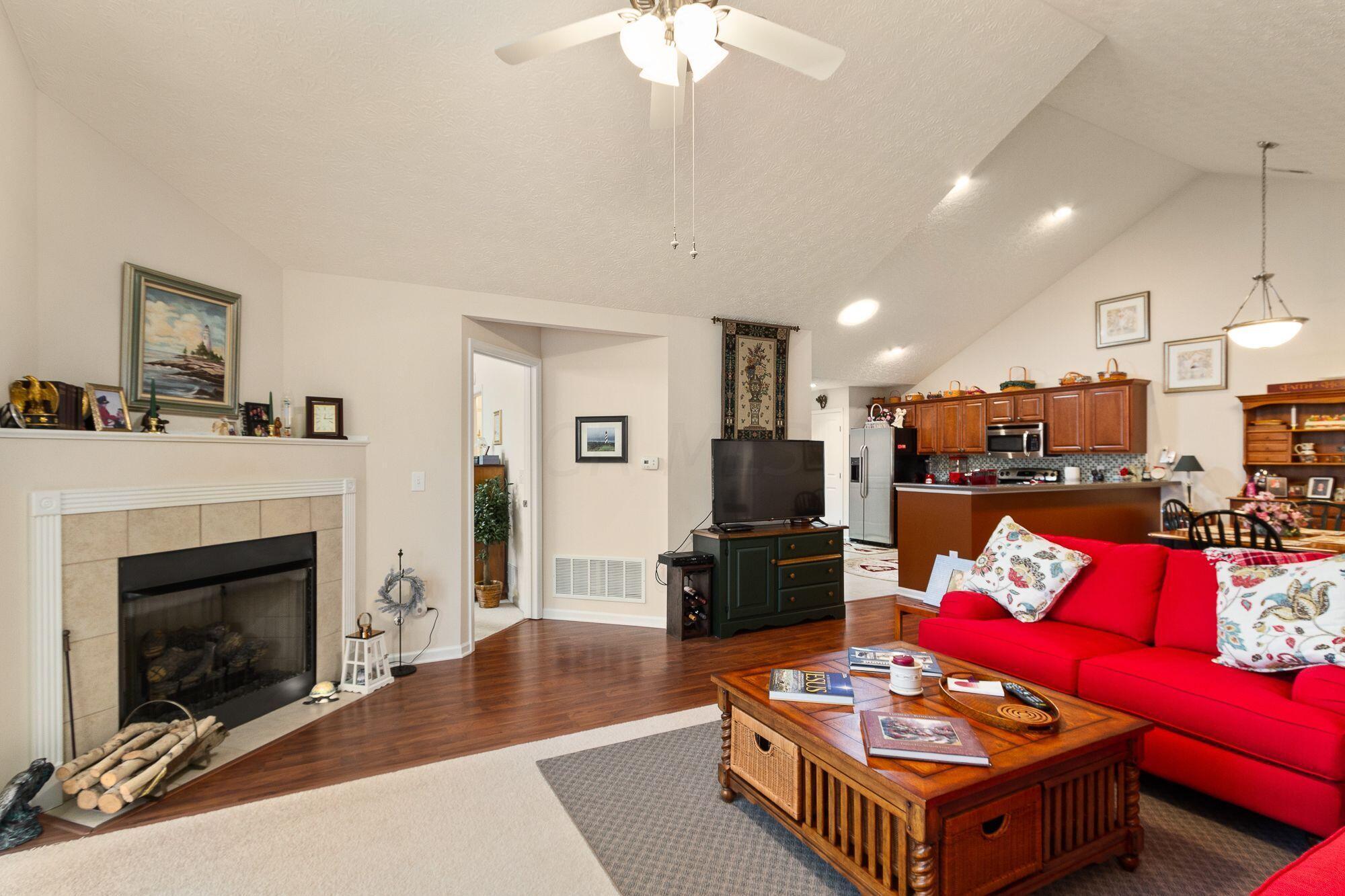 535 Ruttington Lane Westerville, OH 43082 - Photo 2 of 29 Open living area with gas log fireplace