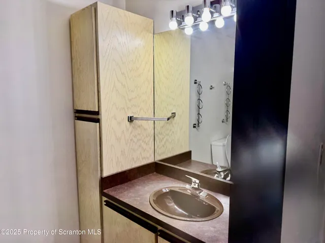 a view of hallway with stairs