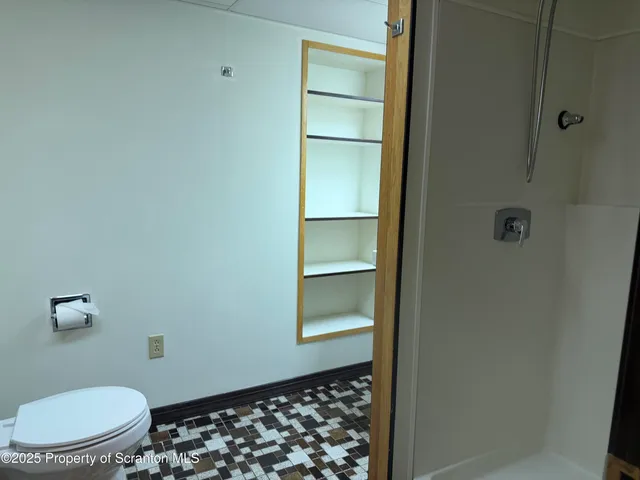 a view of an empty walk in closet