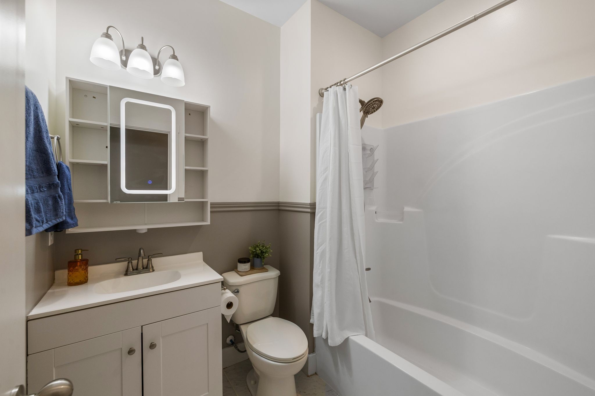 3200 Rucker Road Christiana, TN 37037 - Photo 19 of 31 a bathroom with a sink a toilet and shower