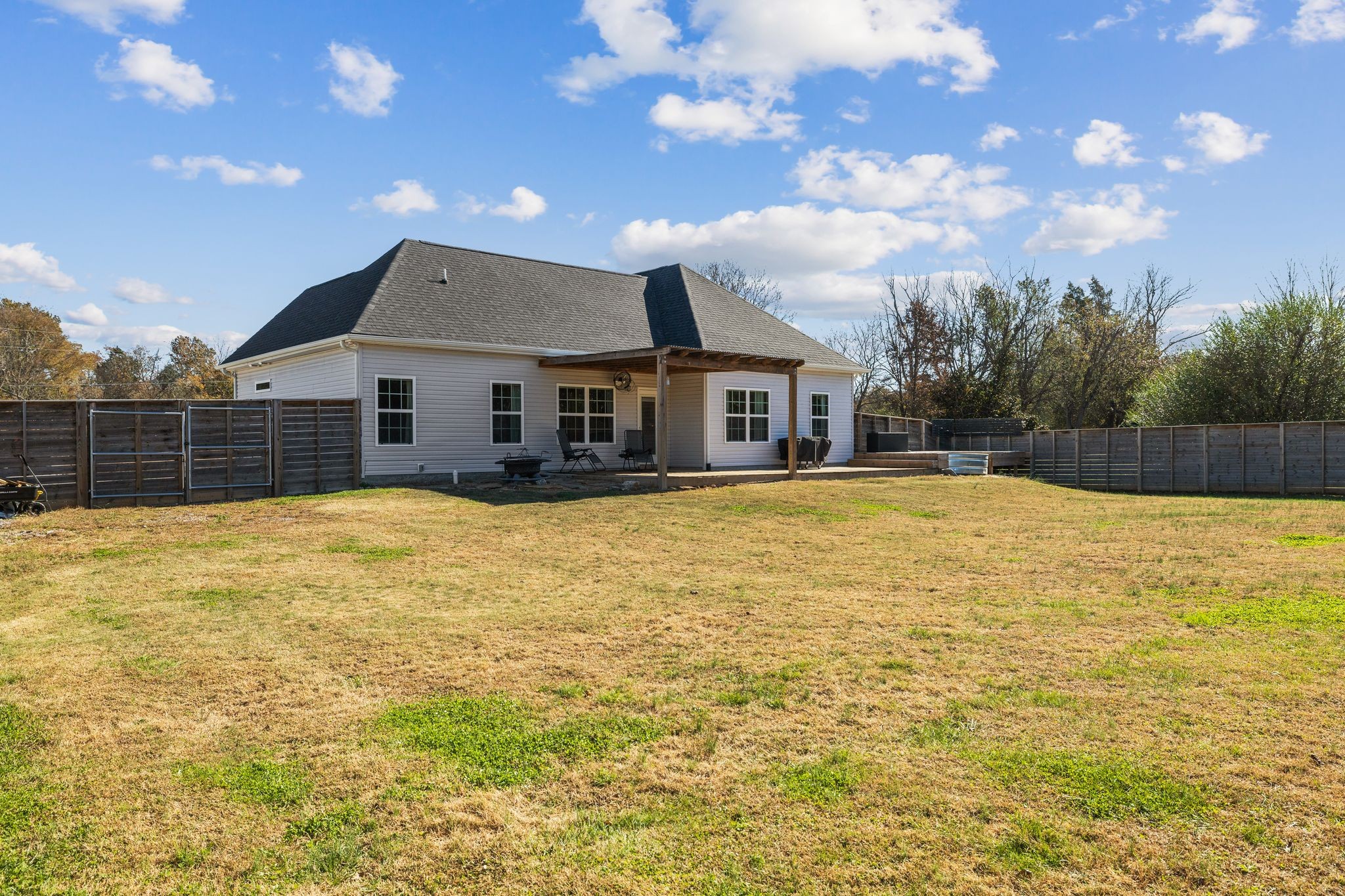 3200 Rucker Road Christiana, TN 37037 - Photo 27 of 31 a view of a house with a swimming pool