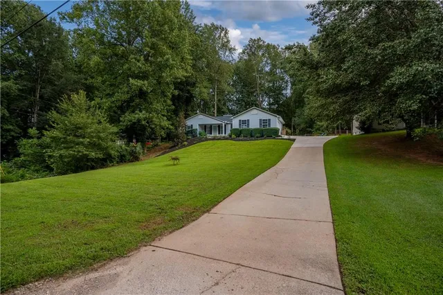 a view of a garden with a fountain