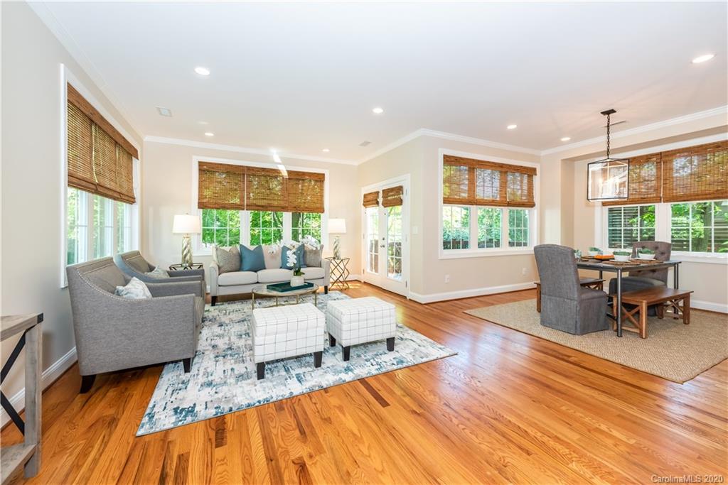 1315 Lilac Road Charlotte, NC 28209 - Photo 15 of 48 a living room with furniture and a wooden floor