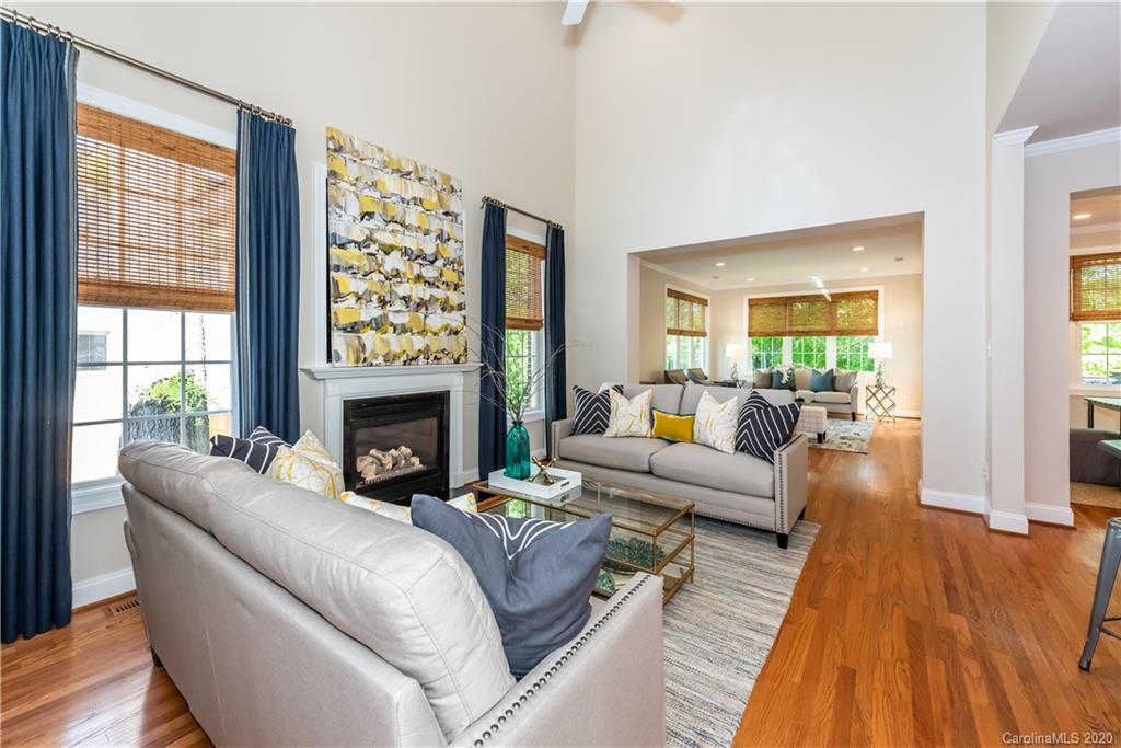 1315 Lilac Road Charlotte, NC 28209 - Photo 18 of 48 a living room with furniture large window and wooden floor