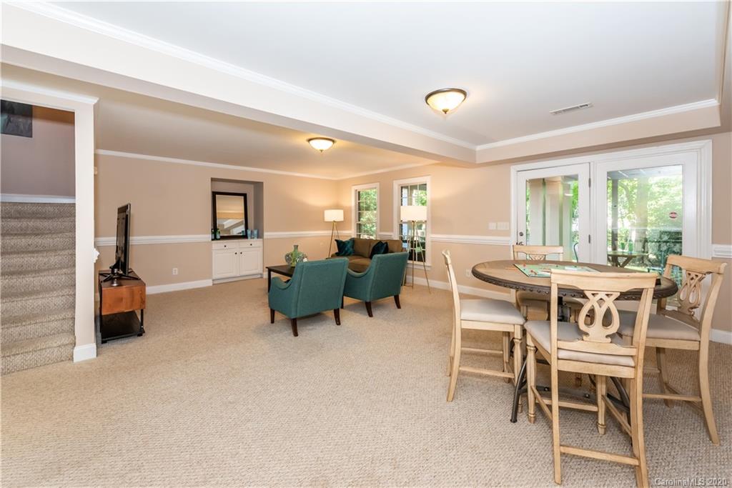 1315 Lilac Road Charlotte, NC 28209 - Photo 30 of 48 a view of a dining room with furniture and a livingroom