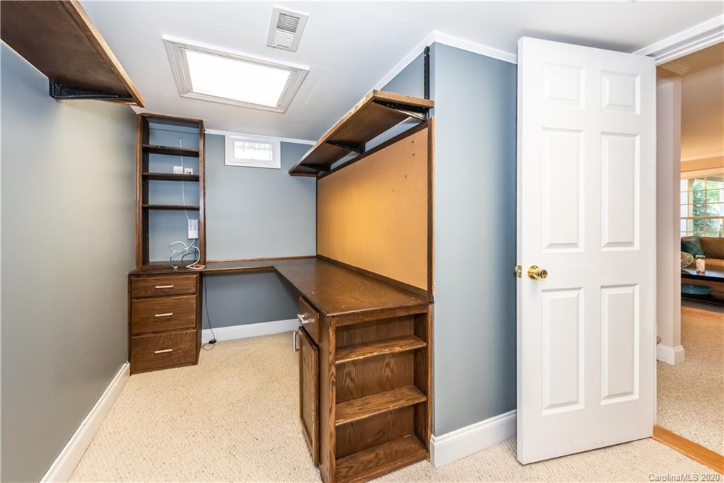 1315 Lilac Road Charlotte, NC 28209 - Photo 33 of 48 a view of room with window and a ceiling fan