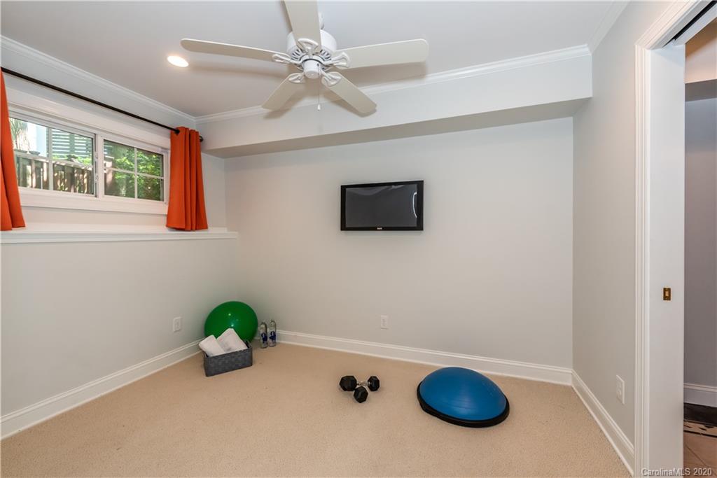 1315 Lilac Road Charlotte, NC 28209 - Photo 35 of 48 a view of kitchen with a fridge a window and a ceiling fan