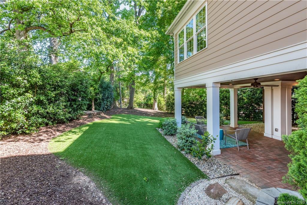 1315 Lilac Road Charlotte, NC 28209 - Photo 45 of 48 a view of a house with backyard and porch