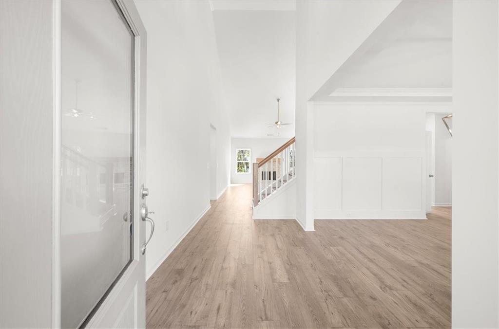 8905 Bethel Road Gainesville, GA 30506 - Photo 12 of 72 a view of a hallway with wooden floor