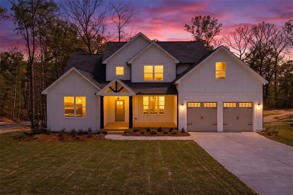 8905 Bethel Road Gainesville, GA 30506 - Photo 2 of 72 a front view of a house with a yard