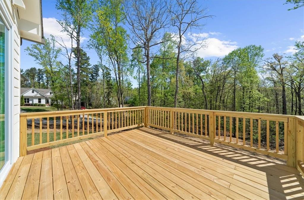 8905 Bethel Road Gainesville, GA 30506 - Photo 33 of 72 a view of balcony with wooden floor and fence