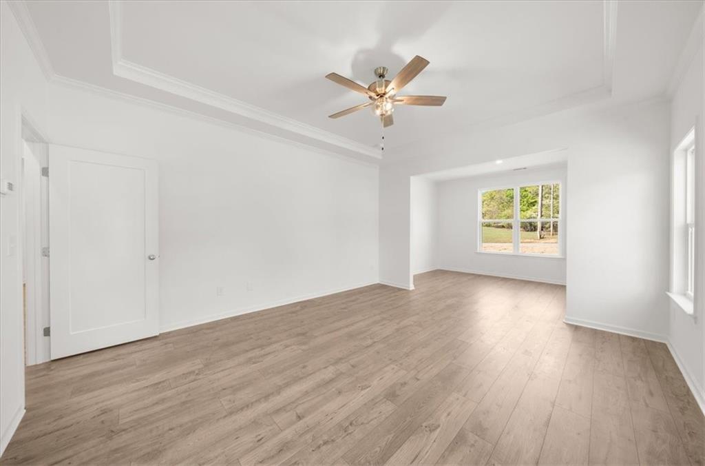 8905 Bethel Road Gainesville, GA 30506 - Photo 39 of 72 wooden floor in an empty room with a window