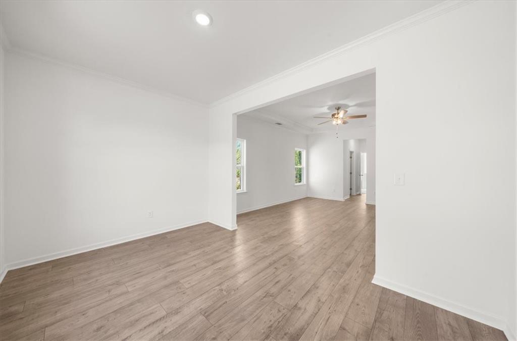 8905 Bethel Road Gainesville, GA 30506 - Photo 41 of 72 a view of a hallway with wooden floor