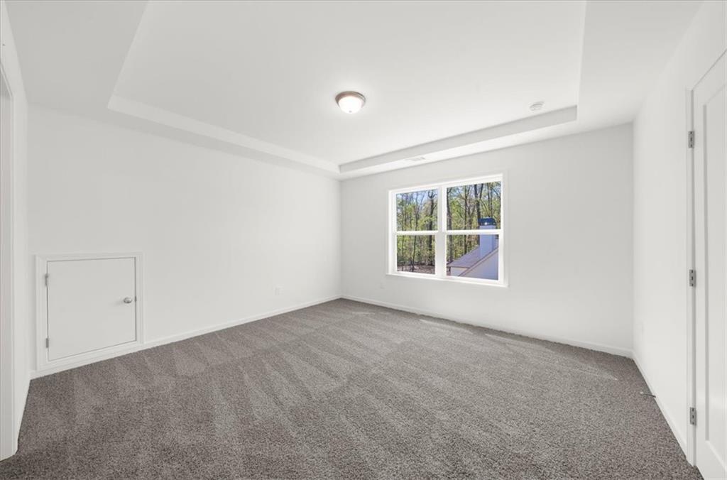8905 Bethel Road Gainesville, GA 30506 - Photo 55 of 72 an empty room with windows