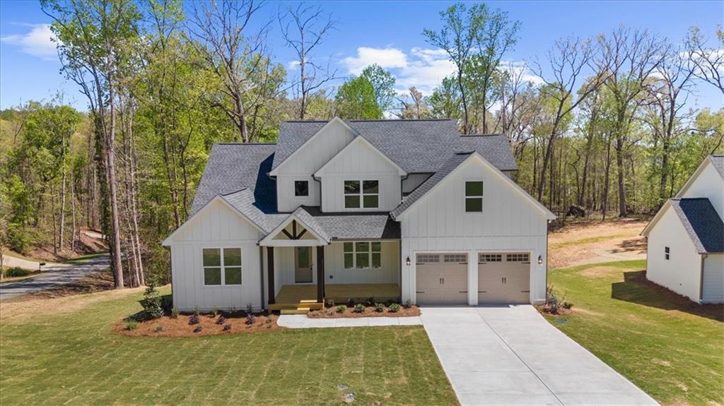 8905 Bethel Road Gainesville, GA 30506 - Photo 6 of 72 a front view of a house with a yard