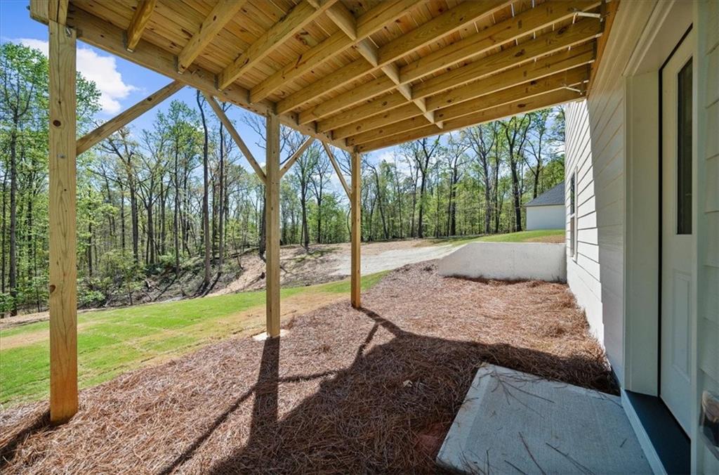 8905 Bethel Road Gainesville, GA 30506 - Photo 66 of 72 a view of a porch with a backyard