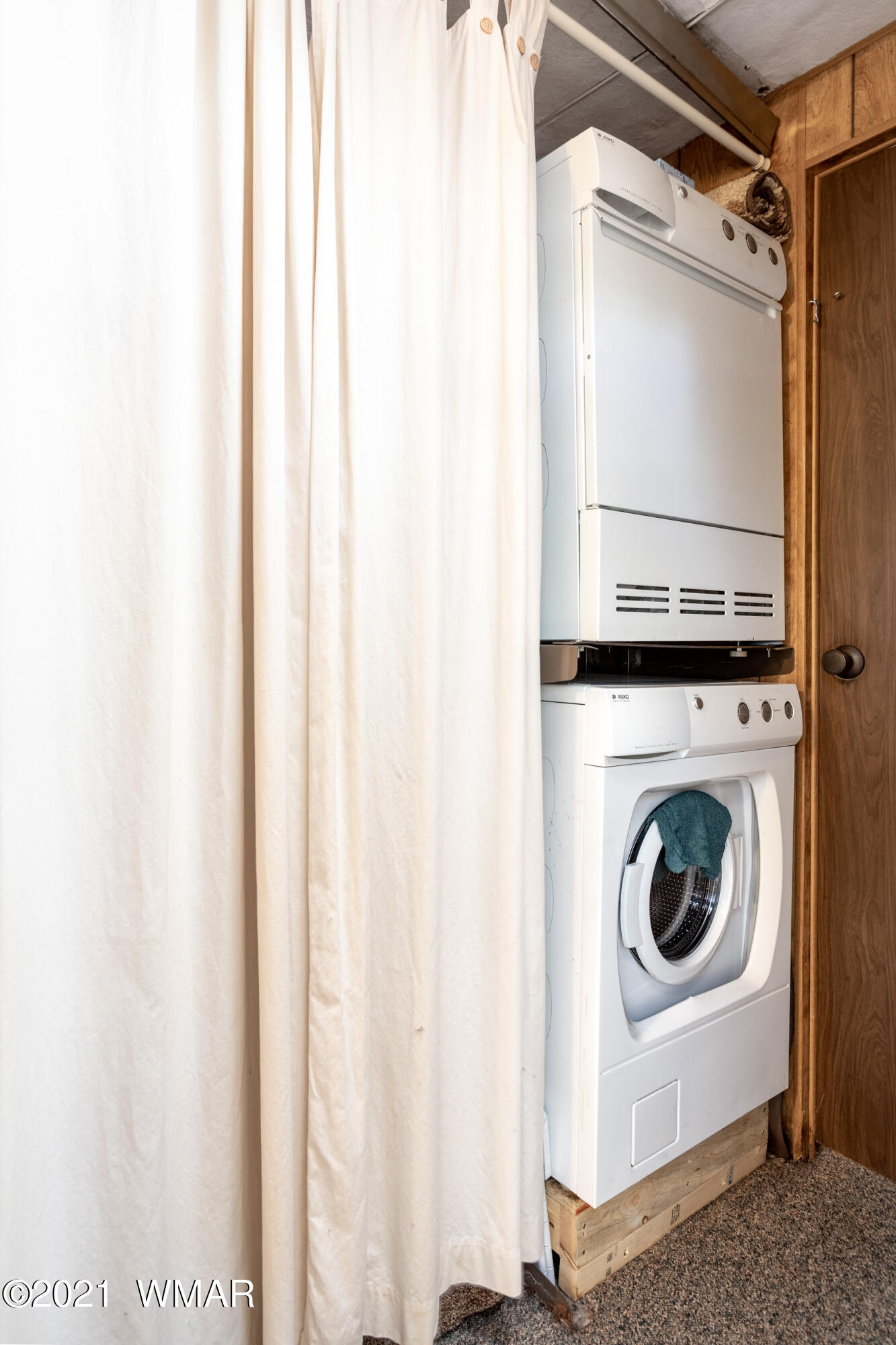 3536 Quail Run Road Overgaard, AZ 85933 - Photo 13 of 26 a utility room with dryer and washer