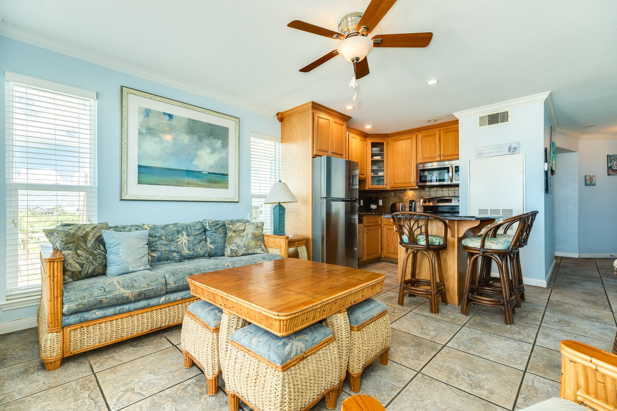 10811 Termini-San Luis Pass Road, Unit 1201 Galveston, TX 77554 - Photo 11 of 25 a view of a livingroom with furniture and a kitchen