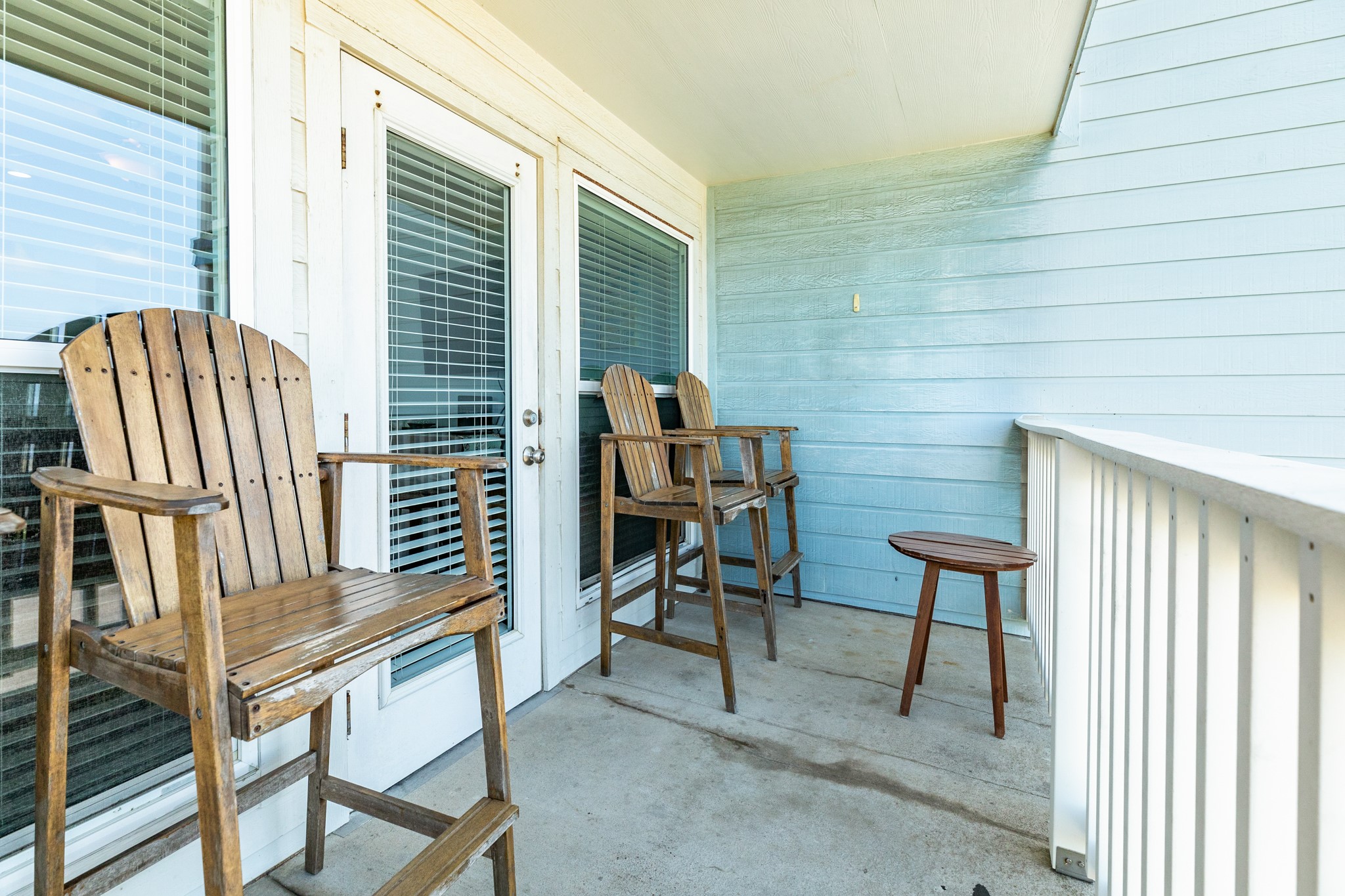 10811 Termini-San Luis Pass Road, Unit 1201 Galveston, TX 77554 - Photo 4 of 25 a view of a balcony with chairs