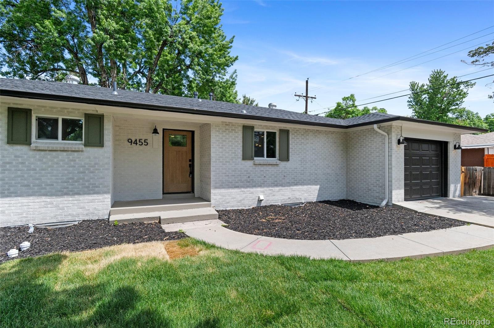 9455 West 37th Avenue Wheat Ridge, CO 80033 - Photo 2 of 33 a view of outdoor space yard and house