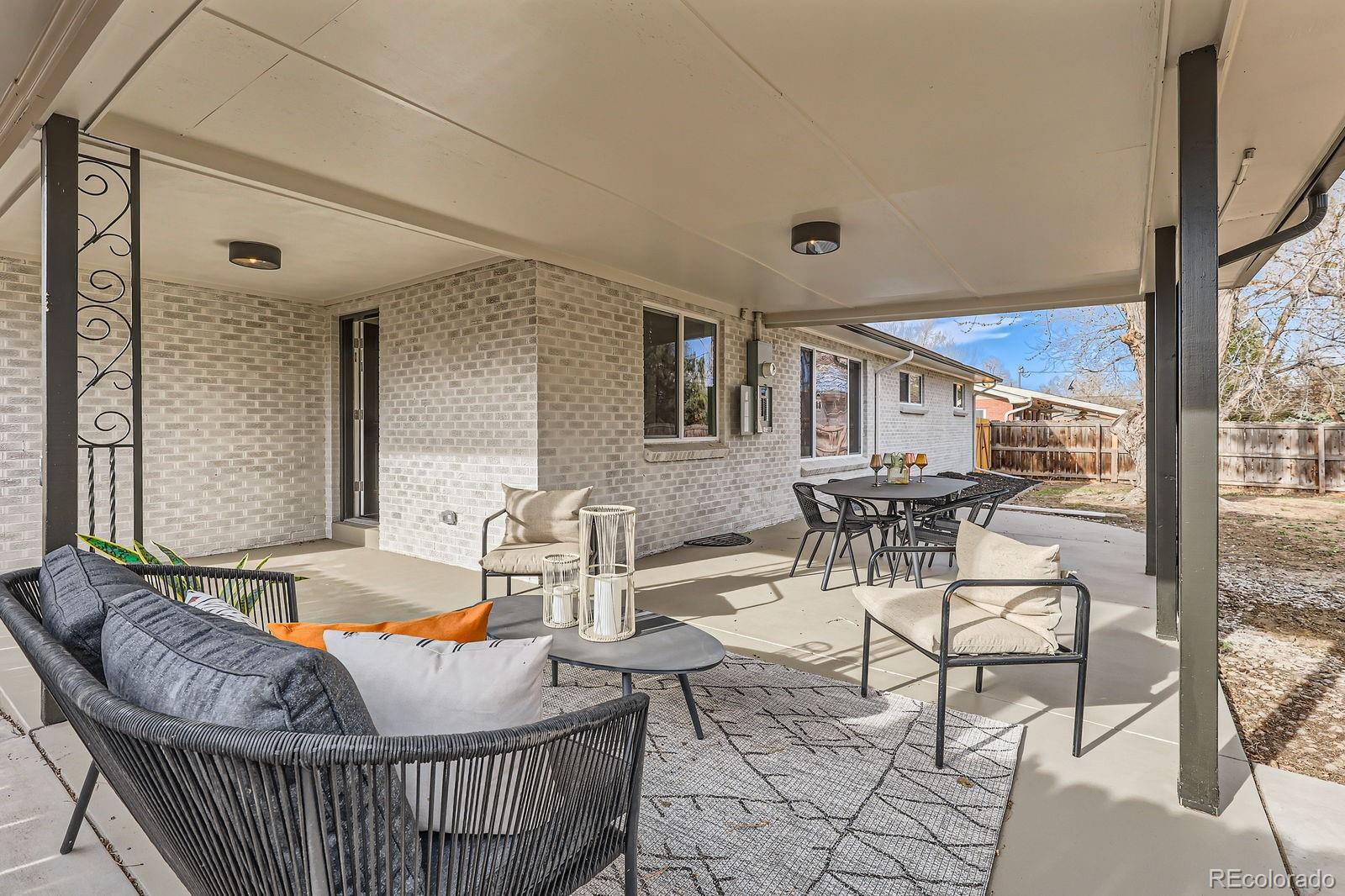 9455 West 37th Avenue Wheat Ridge, CO 80033 - Photo 28 of 33 a living room with furniture and a large window