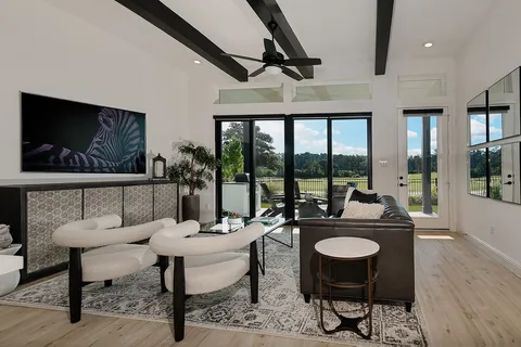 a view of a livingroom with furniture and window