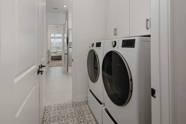 a utility room with dryer and washer