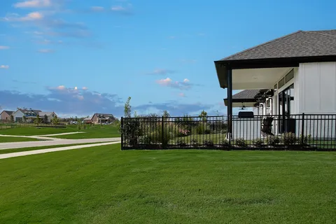 a view of a house with a big yard